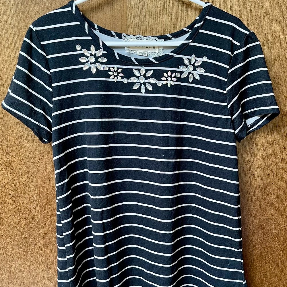 $35 btween girl's dress size 7/8 black/white striped with neck detail